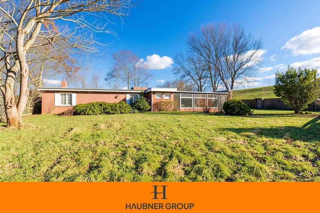 Immobilie in Butjadingen - Wo die Nordsee zum Alltag wird – Bungalow in traumhafter Deichlage - Bild 0