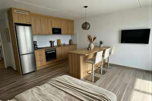Charmante,moderne Einzimmerwohnung mit verglastem Balkon