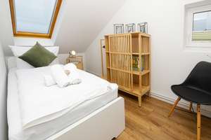 Küstenflair trifft Komfort – stilvolle Ferienwohnung in Büsum – Die vollständige Adresse der Immobilie erhältst du vom Anbieter., 25761 Büsum – Vorschaubild 14