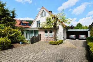 Modernes Zuhause für die Familie mit traumhaftem Garten in bester Wohnlage