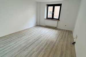 Attraktive 2-Zimmer-Wohnung mit Gartenanteil