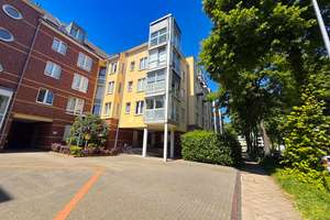 Maisonettewohnung mit 2 Zimmern, Balkon, Küche, Bad, Gäste-WC mit Tiefgaragenstellplatz & Aufzug