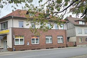 Zentral gelegenes Mehrfamilienhaus mit 10 Einheiten und eigenem Garagenhof – Lüneburger Straße 6-8, 29633 Munster – Vorschaubild 2