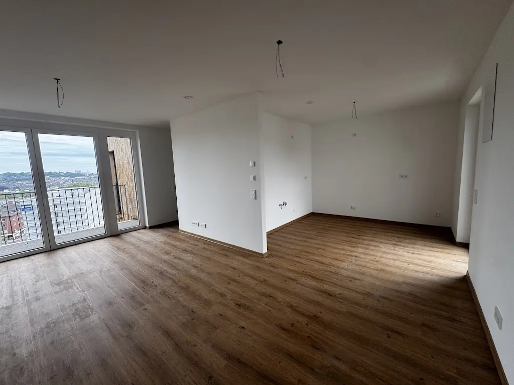 Exklusive 3-Zimmer-Wohnung im Neubau mit Dachterrasse & Aufzug - Photo 2