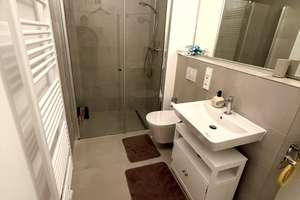 Stylische 1.5 Zimmer Neubauwohnung, große Loggia, teilmöbliert – Leinweberweg 36, 81249 Lochhausen, München – Vorschaubild 9