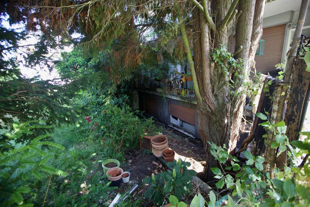 Immobilie in Darmstadt - Charmantes Mehrfamilienhaus mit Potenzial – sanierungsbedürftige Liegenschaft mit Garten und Garagen - Bild 4