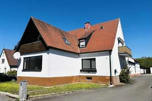Frisch modernisiertes 1-2 Fam.-Wohnhaus mit mehreren Hallen/Garagen im stadtnahen Grün, Nfl. 900m² – Die vollständige Adresse der Immobilie erhältst du vom Anbieter., 97437 Haßfurt – Vorschaubild 1