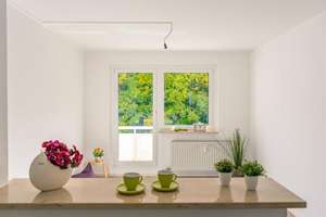 Modernisierte Erdgeschosswohnung mit Balkon