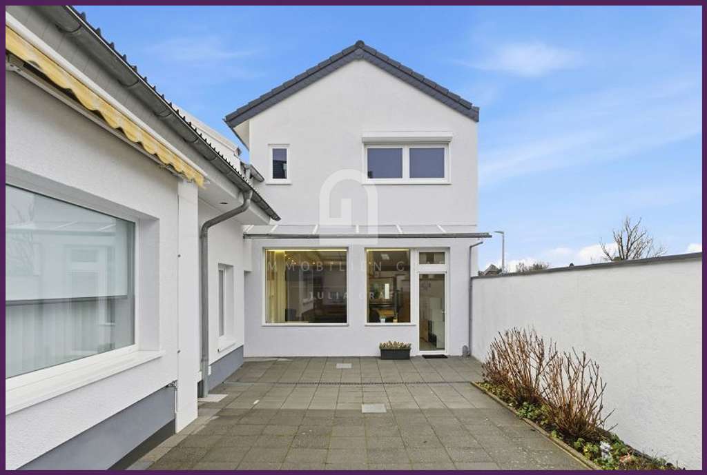 Immobilie in Elsdorf - Wohnen & Vermieten – besonderes Ensemble mit Garten, Garage & Perspektive - Bild 1