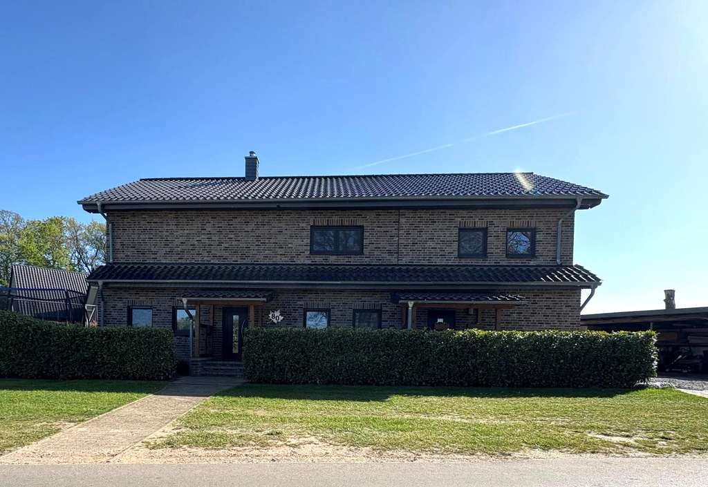 Immobilie in Alfhausen - Geräumiges und kernsaniertes Einfamilienhaus mit 2. Wohneinheit in Alfhausen - Bild 1