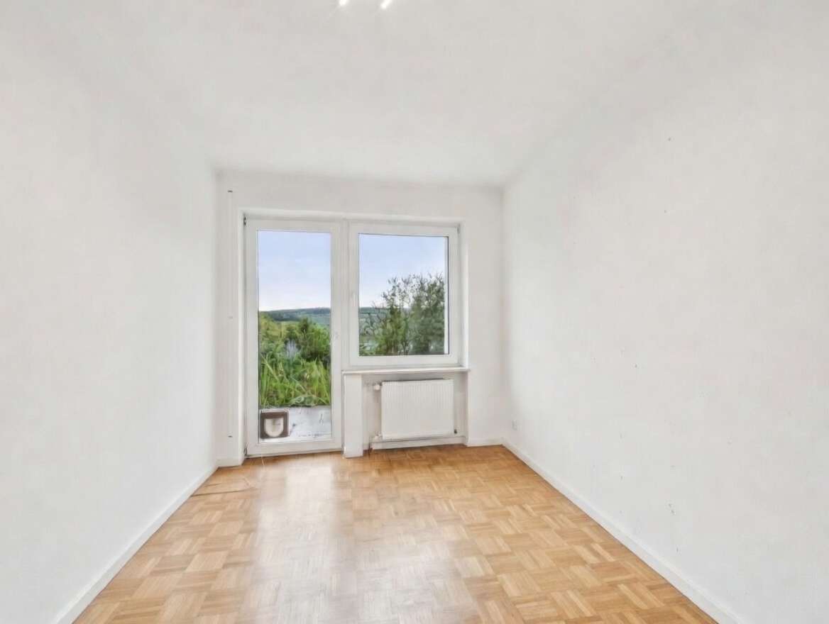 Immobilie in Wellen - Renovierte 5-Zimmer Erdgeschosswohnung mit Garten in Wellen - Bild 9