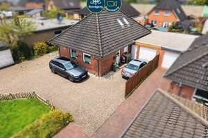 BUNGALOW IN RUHIGER LAGE MIT KAMIN, FUSSBODENHEIZUNG, MODERNEM BADEZIMMER UND ELEKTRISCHER GARAGE – Die vollständige Adresse der Immobilie erhältst du vom Anbieter., 26125 Ofenerdiek, Oldenburg (Oldenburg) – Vorschaubild 1
