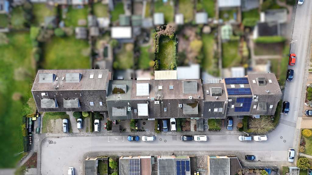 Immobilie in Dormagen - Vollvermietetes Dreifamilienhaus mit Ausbaupotenzial in Dormagen-Delhoven - Bild 1