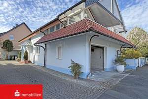 Wohnen mit Charme: Einfamilienhaus mit idyllischem Wintergarten!