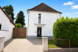 Charmantes freistehendes Einfamilienhaus mit großem Potenzial und Garten