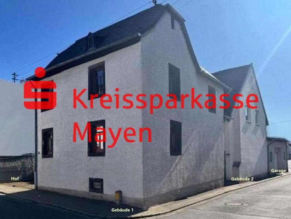 Vielseitiges Mehrfamilienhaus mit Gewerbeeinheit in zentraler Lage
