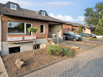 Erftstadt Lechenich! Familienideales Reihenmittelhaus! Wickrath-Klinkerhaus  mit Sonnenterrasse, idyllischem Gartenareal, 2 Stellplätzen und einer  Garage in zentrumsnaher Ruhiglage!(CA 4453) auf