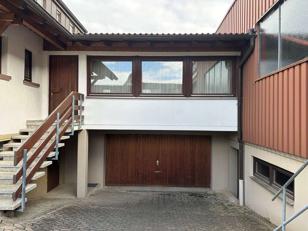 Immobilie in Pfalzgrafenweiler - Einfamilienhaus mit Gewerbehalle in Pfalzgrafenweiler - Bild 1