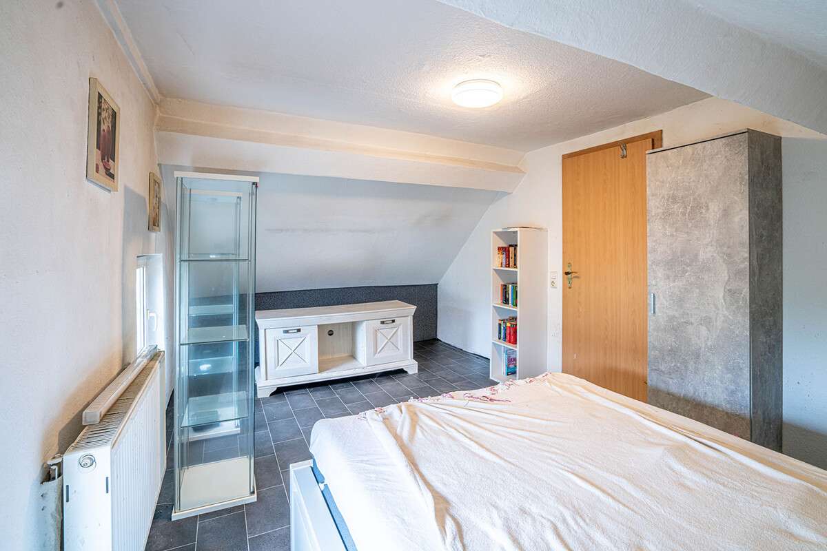 Immobilie in Bedburg - Historisches Wohnhaus anno 1860 mit modernem Anbau, Kamin & Entwicklungspotenzial - Bild 10