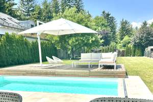 Luxuriöses Anwesen mit Pool und großem Garten an der Aubinger Lohe