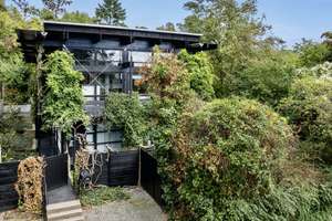 Für Individualisten! Außergewöhnliches Architektenhaus am Berger Hang mit separater Einliegerwohnung