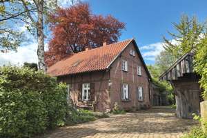 Historisches Fachwerkhaus (Wiederaufbau in Feldhausen um 1880) mit massivem Anbau (1980)