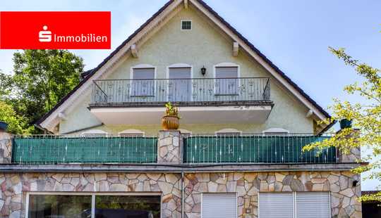 Bild von Zweifamilienhaus mit Gewerbeeinheit in Brechen 
