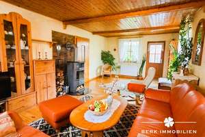 BERK Immobilien – Wohnen mit Urlaubsfeeling: Gemütliches Einfamilienhaus mit idyllischem Garten in W – 63939 Wörth am Main – Vorschaubild 1