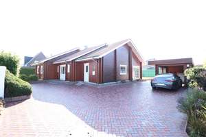 Topgepflegtes, schickes Holzwohnhaus mit Carport-/Gerätegebäude in ruhiger Sackgassenlage – Die vollständige Adresse der Immobilie erhältst du vom Anbieter., 49696 Molbergen – Vorschaubild 1