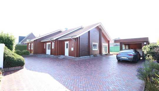 Bild von Topgepflegtes, schickes Holzwohnhaus mit Carport-/Gerätegebäude in ruhiger Sackgassenlage