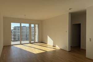 Erstbezug 3-Zimmerwohnung mit Gartenterrasse am Rhein