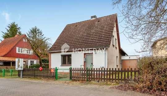 Bild von Einfamilienhaus mit Garten, Terrasse und Garage mit Potenzial