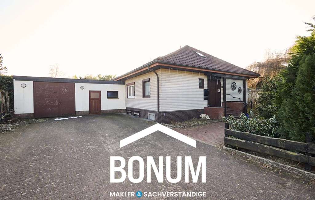 Immobilie in Schwanewede - SCHWANEWEDE / Raumwunder // voll ausgebauter Bungalow mit Wohnkeller auf 1000 qm  // ruhige Lage - Bild 0