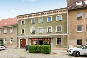Lukrative Investition mit 7,6 % Rendite: Voll vermietetes MFH mit Gewerbeeinheit und 2 Wohneinheiten – Die vollständige Adresse der Immobilie erhältst du vom Anbieter., 15806 Zossen – Vorschaubild 2