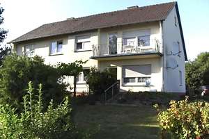 Gepflegtes Mehrfamilienhaus mit 4 Wohneinheiten in Melle. – Die vollständige Adresse der Immobilie erhältst du vom Anbieter., 49328 Mitte (Ortsteil), Berlin – Vorschaubild 1