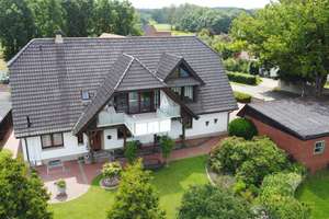Ländliches Paradies: Einfamilienhaus mit großem Grundstück und vielseitigen Nutzungsmöglichkeiten! – Die vollständige Adresse der Immobilie erhältst du vom Anbieter., 49497 Mettingen – Vorschaubild 2