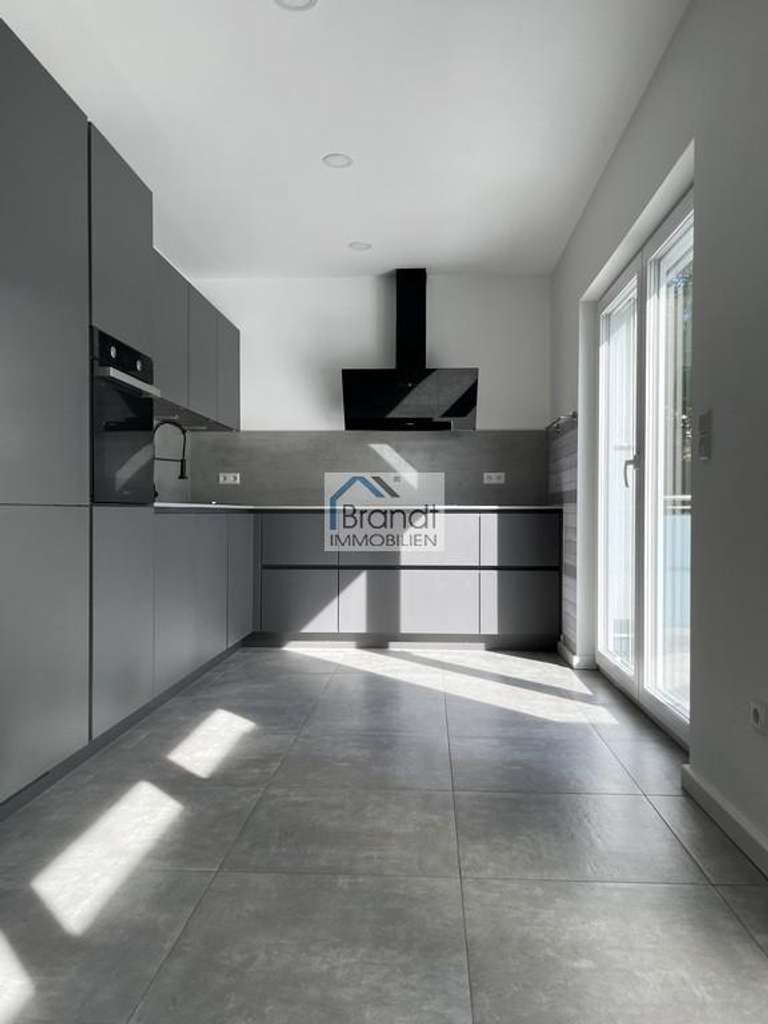 Immobilie in Rosdorf - Lichtdurchflutete 3-Zimmer-Wohnung, traumhafte Dachterrasse und niedrigen Energiekosten in Rosdorf! - Bild 2