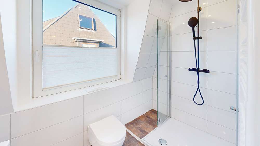 Immobilie in Sylt - Renovierte Doppelhaushälfte mit Garten – zentral gelegen auf Sylt - Bild 11