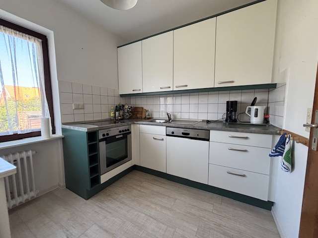 Immobilie in Langeoog - Wunderschönes  Insulanerhaus mit drei Wohnungen und herrlichem Garten - Bild 20