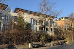 Attraktive 3,5 Zimmer-Erdgeschosswohnung mit Garten, sonniger Terrasse und Wintergarten