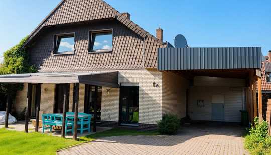 Bild von Charmantes Einfamilienhaus mit Carport, Garten & Kamin – teilsaniert und lichtdurchflutet!