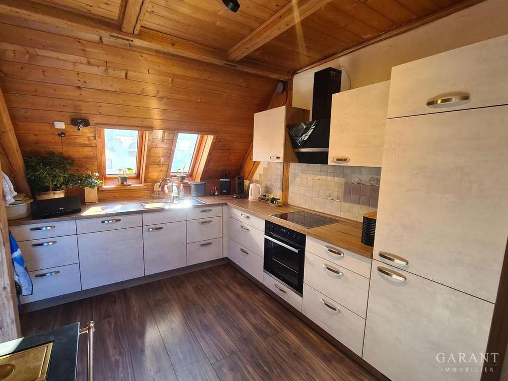 Immobilie in Füssen - Großzügige Dachgeschoss-Wohnung mit ausgebautem Dachspitz & Gemeinschaftsgarten - Bild 2