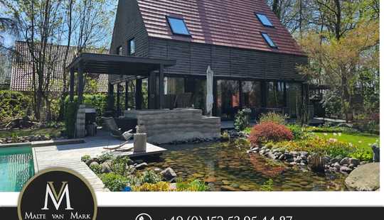 Bild von Wohnensemble bestehend aus stilvollem Traumhaus  und separatem zweiten Haus am Elisabethfehnkanal