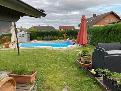 Attraktives Mehrfamilienhaus mit 4 Wohneinheiten, großem Garten, Pool und Ausbaupotential
