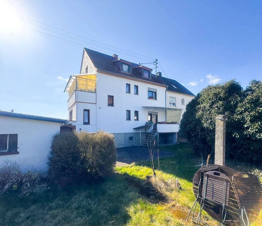 Immobilie in Hadamar - Solides Zweifamilienhaus mit Garten und Garage in Niederhadamar! - Bild 2