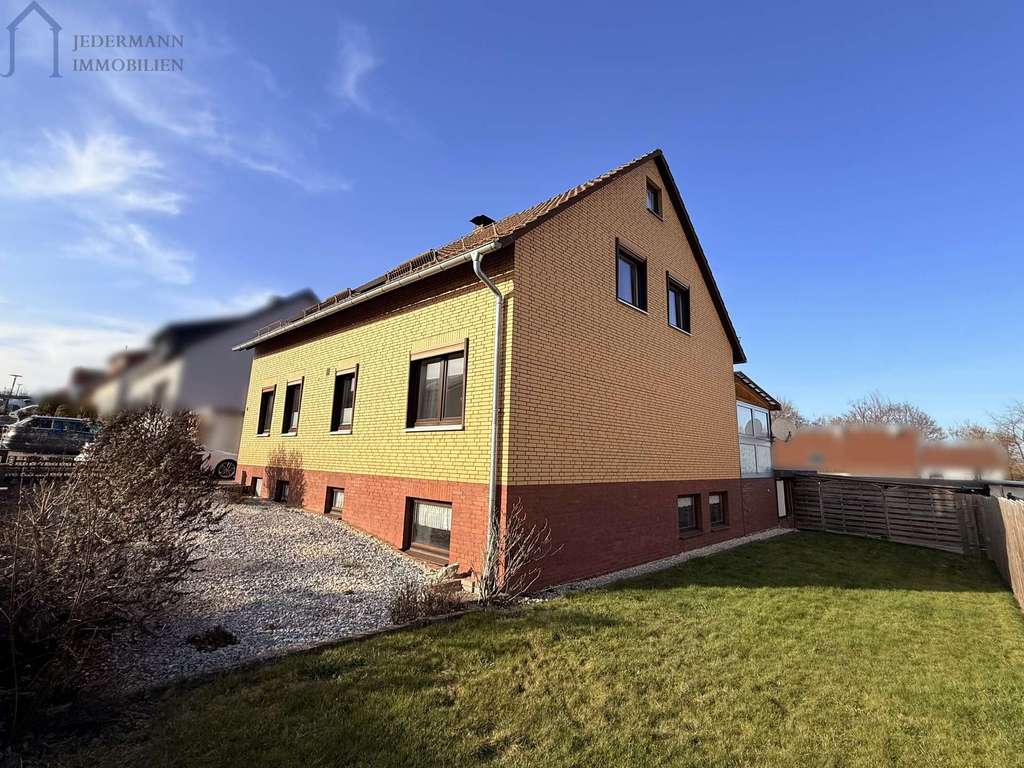 Immobilie in Bilshausen - Zweifamilienhaus mit Wintergarten, Sauna & Garten in Göttingen - Bilshausen! - Bild 1