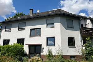 Große Vierzimmerwohnung mit Garage und Gartenanteil in Laubenheim