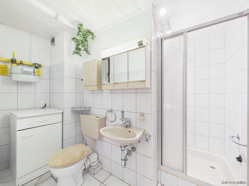 Immobilie in Bornich - Einfamilienhaus mit Garage, Werkstatt und Einliegerwohnung in Bornich zu verkaufen - Bild 4