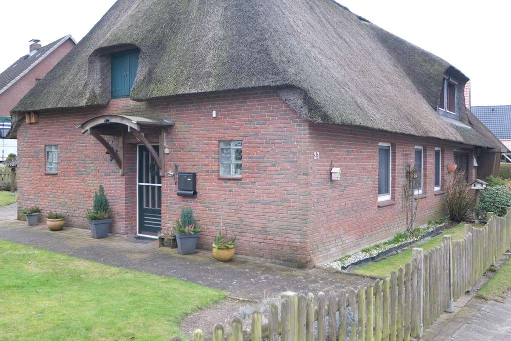 Immobilie in Goosefeld - Wohnen unter Reet: Kleine Reetdach-Doppelhaushälfte im alten Dorfkern von Goosefeld - Bild 0