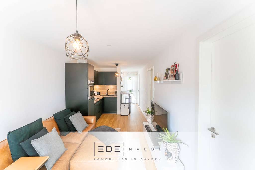 Immobilie in Unterföhring - Lichtdurchflutete Wohnung mit Terrasse und schönem Garten in Bestlage - Bild 0